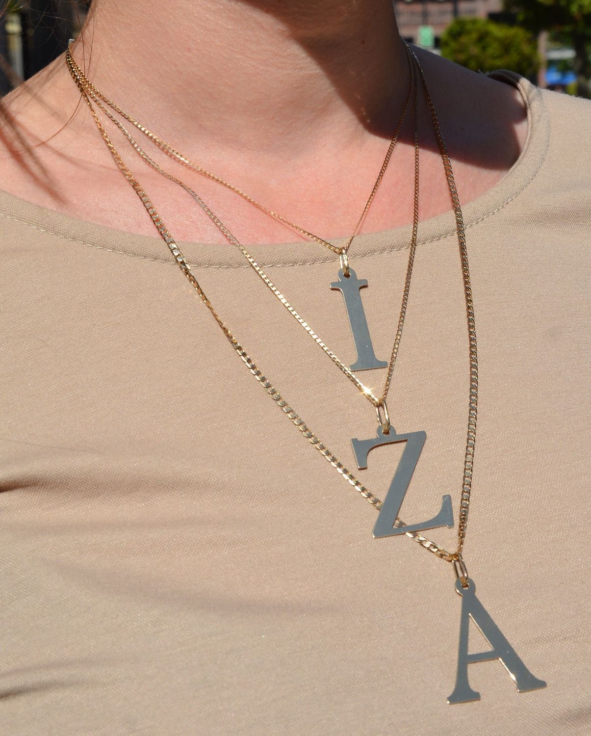 Złota zawieszka w kształcie literki N wykonana z wysokiej jakości złota 585..jpg